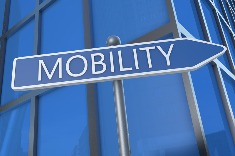 Mobility - illustration with street sign in front of office building.